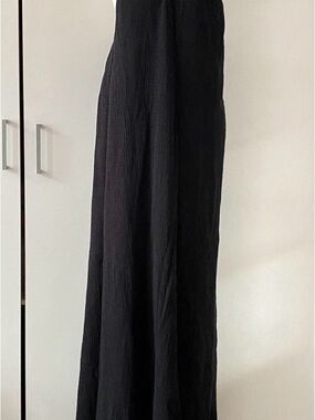 Free People Black Midi Skirt with Flowing Silhouette